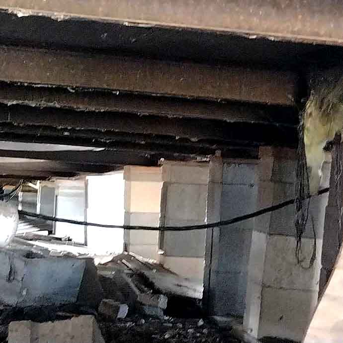 Blocks used as piers in re-leveling  manufactured housing